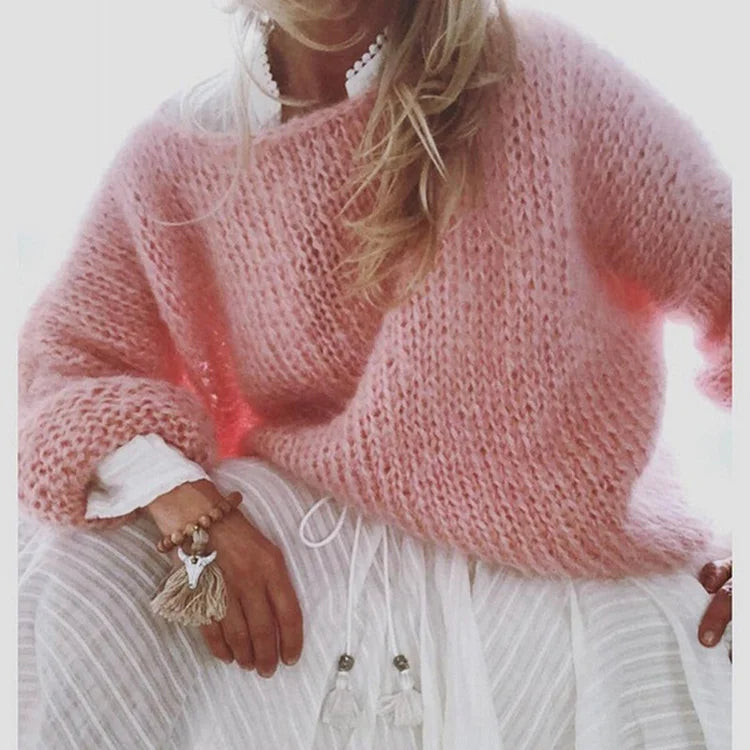 Elegant women's oversized long-sleeve knit pullover. Soft, relaxed fit sweater for chic casual & winter fashion.