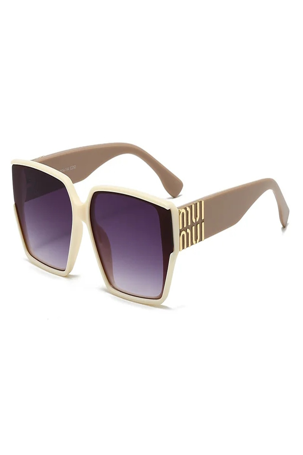 Women's oversized square sunglasses with elegant gold detail. Tinted lenses offer sun protection.
