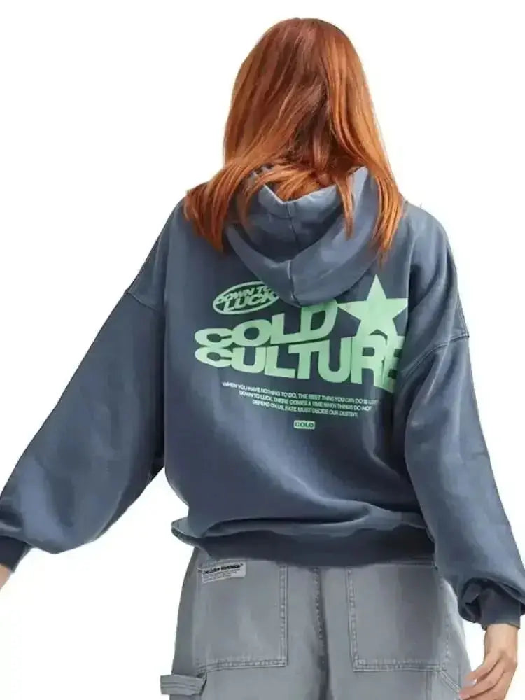 Women's oversized streetwear hoodie with bold graphic print, perfect for urban fashion & casual, relaxed fit.