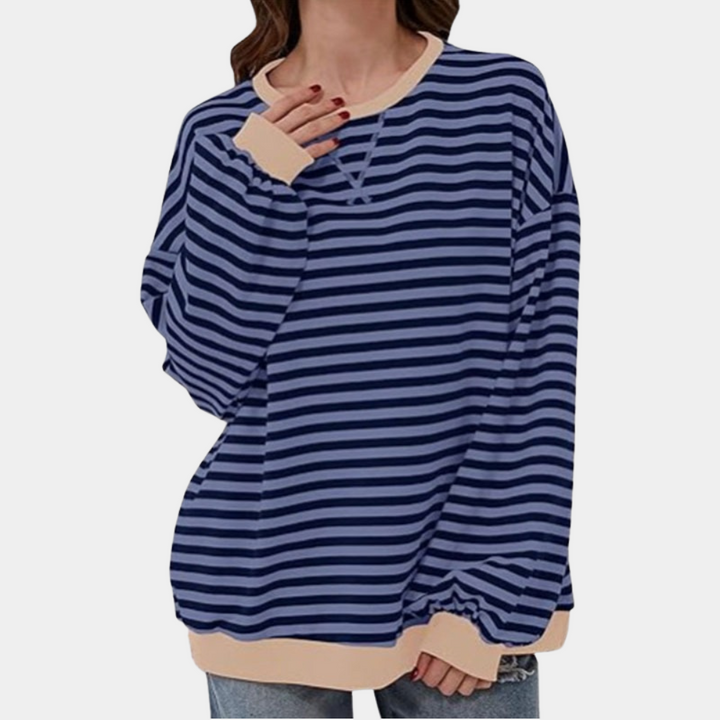 Stylish women's oversized striped long sleeve t-shirt. Fashionable, relaxed casual top for versatile wear.