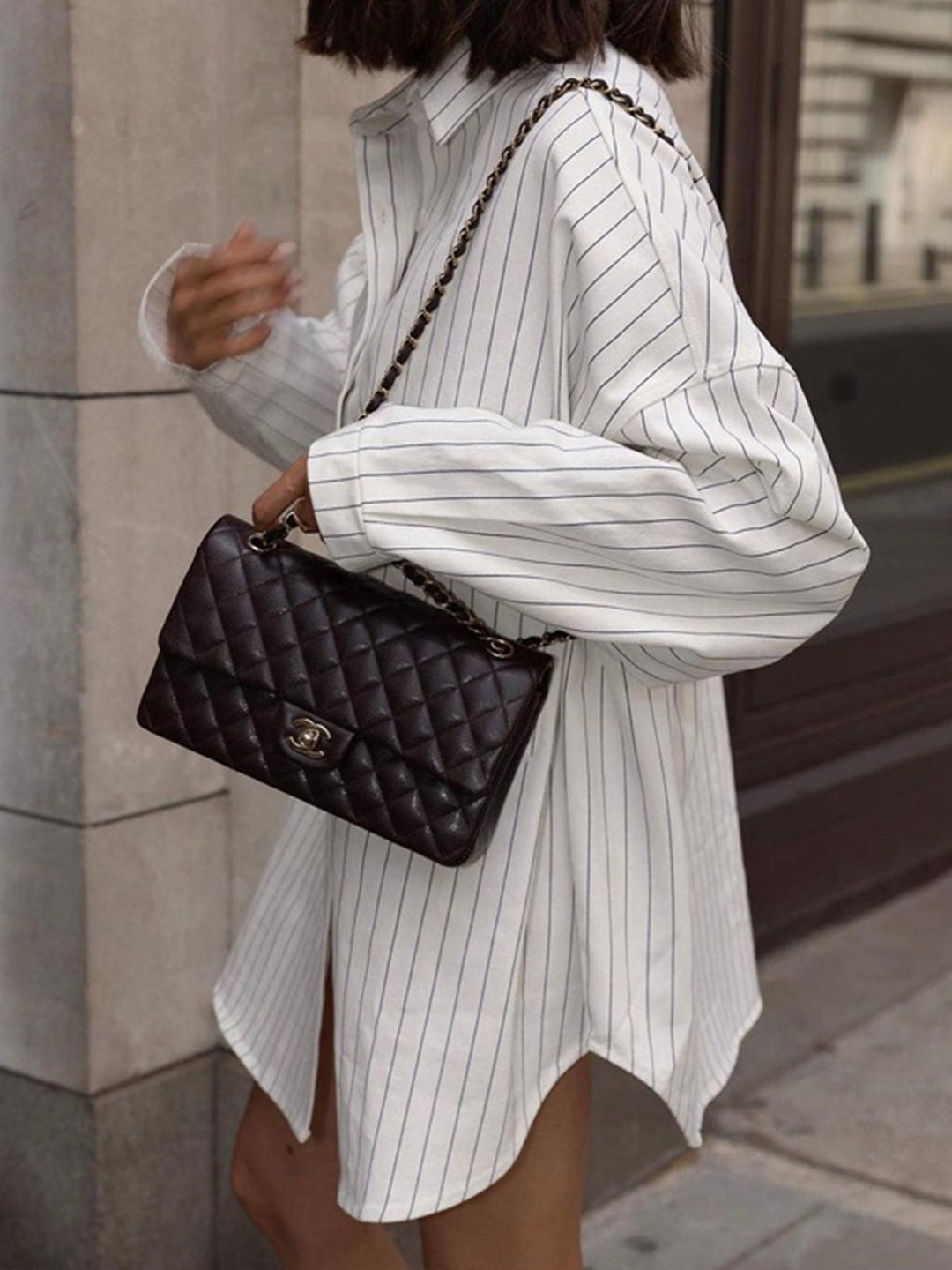 Versatile women's oversized striped shirt dress, a comfortable long-sleeve button-down for day-to-night wear.