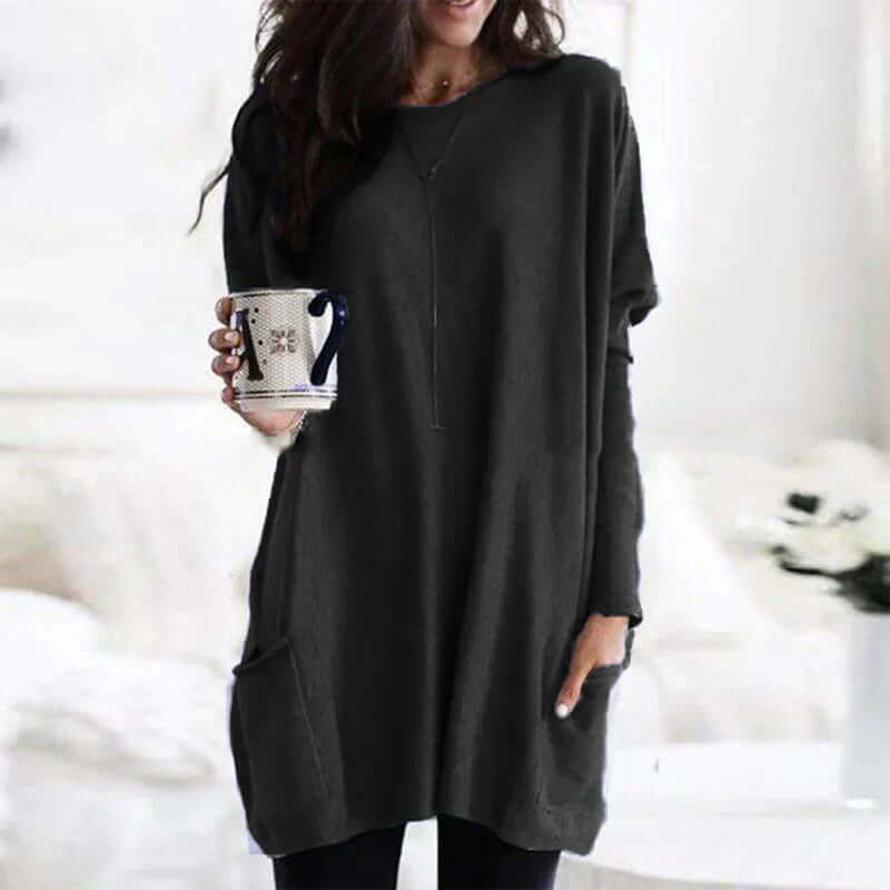 Soft knit oversized women's sweater, a versatile long sleeve tunic for cozy casual comfort.