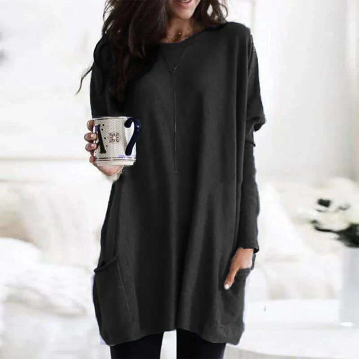 Soft knit oversized women's sweater, a versatile long sleeve tunic for cozy casual comfort.