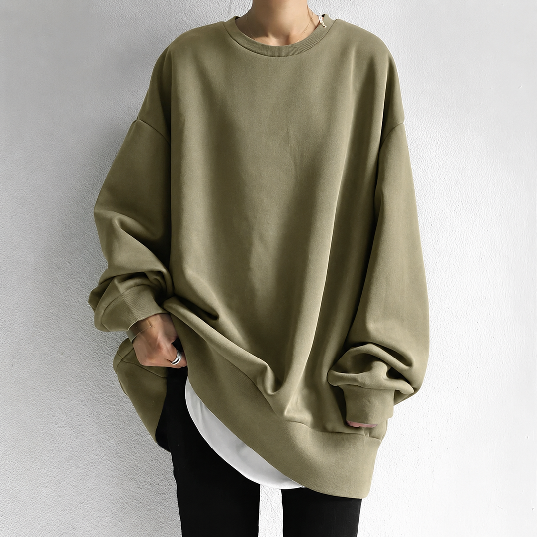 Stylish women's oversized tunic sweater offering cozy comfort, relaxed fit, long sleeves. Ideal for winter fashion.