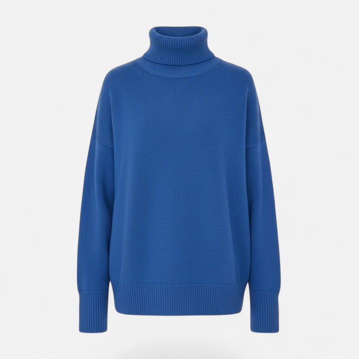 Oversized silhouette of a women's warm winter fashion knit sweater.