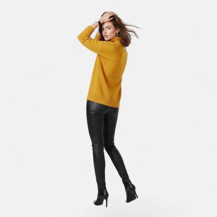 Versatile women's turtleneck sweater, great for layering in winter.