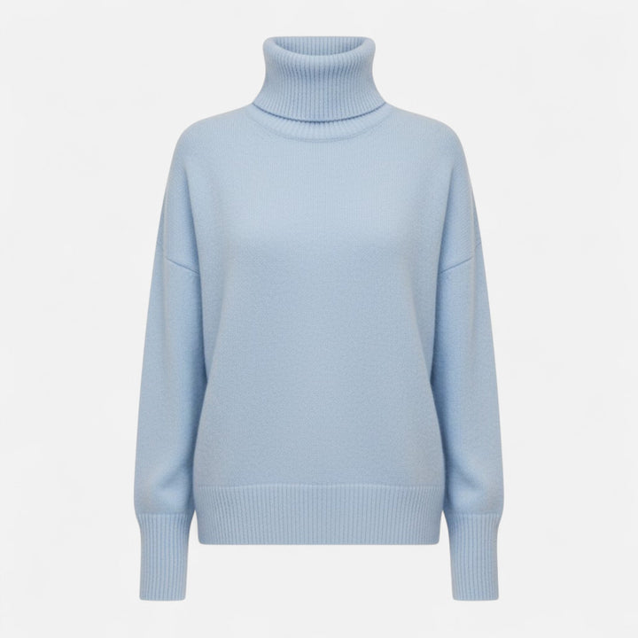 Elegant women's turtleneck sweater, blending warmth with oversized style.