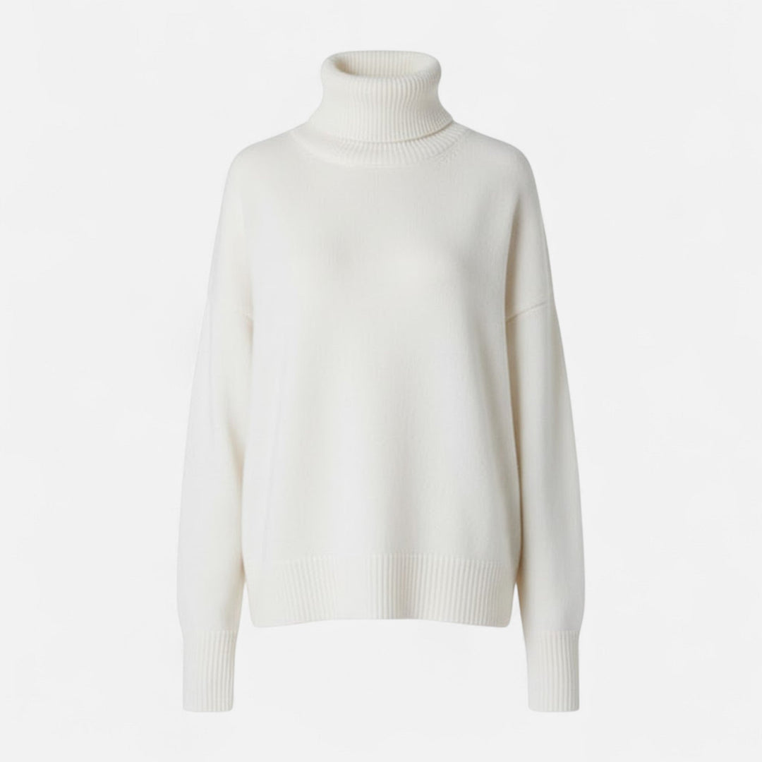 Detailed view of the ribbed cuffs and hem on a women's warm knit sweater.