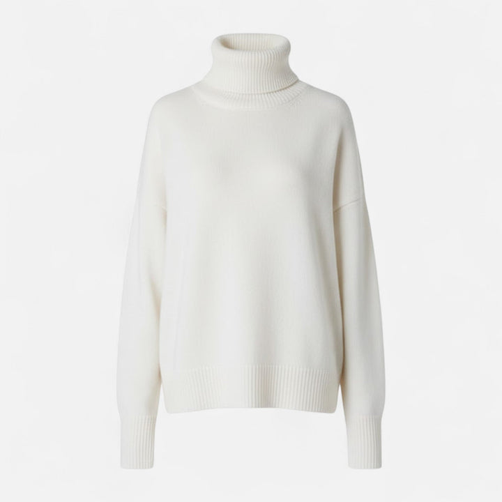 Detailed view of the ribbed cuffs and hem on a women's warm knit sweater.