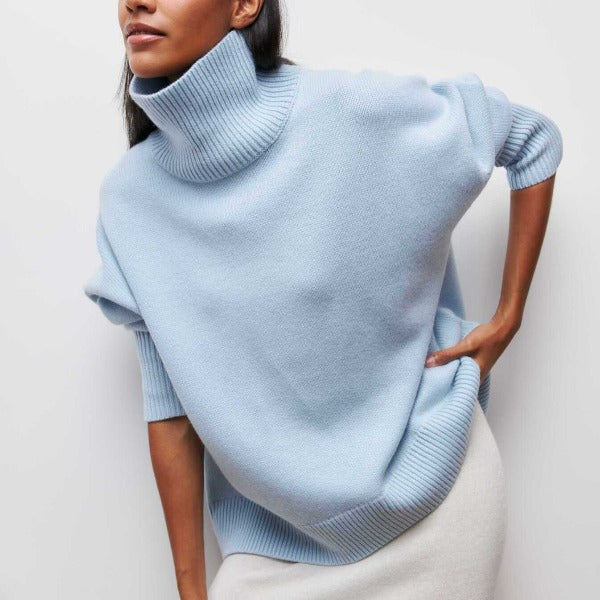 Women's oversized turtleneck sweater jumper. Cozy long sleeve knit for fall & winter fashion.