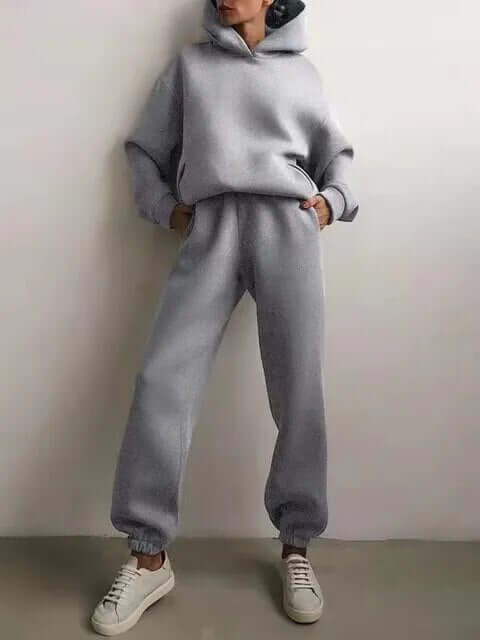 Women's oversized hoodie and jogger set. Perfect casual two-piece outfit for lounging or errands, comfy wear.