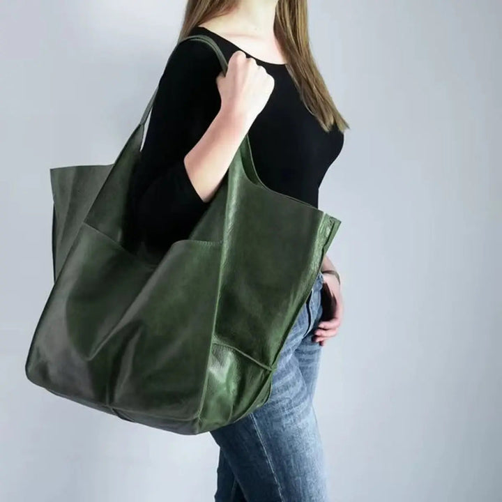 Women's oversized vegan leather tote bag, perfect for everyday carry & work.