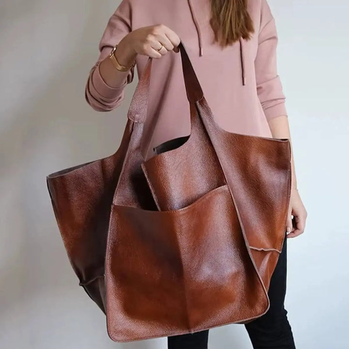 Premium vegan leather travel bag for women, a spacious and chic tote design.