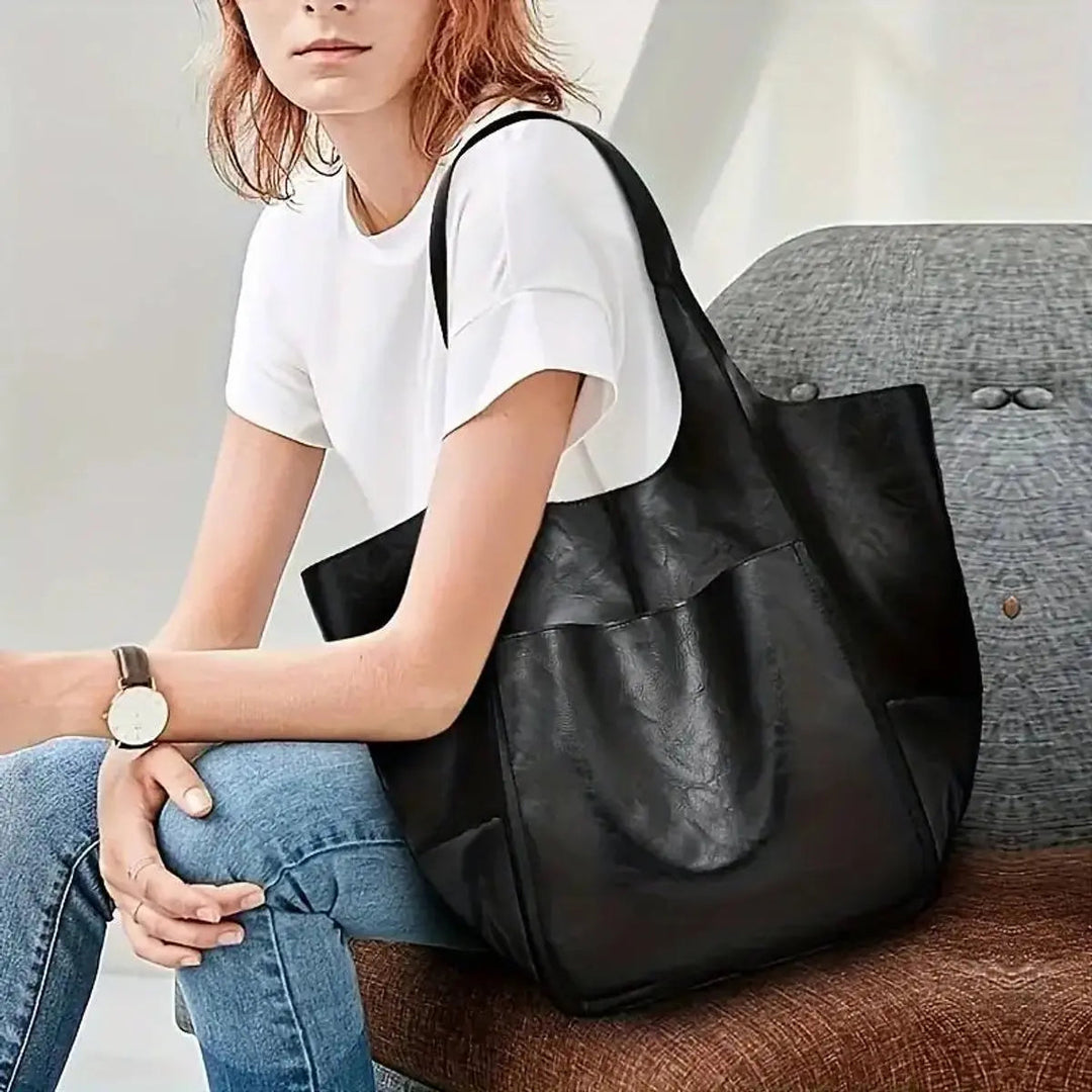 Sophisticated oversized vegan leather tote for women, a perfect fashion accessory.
