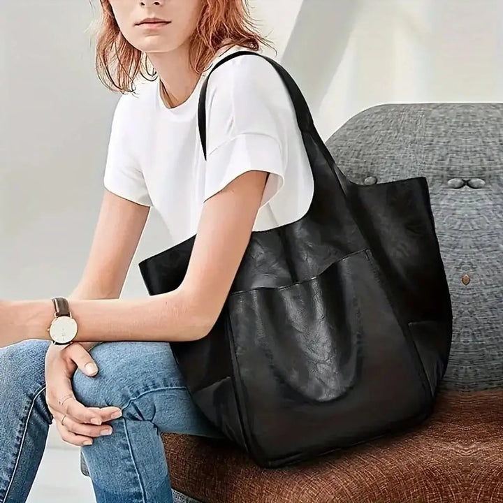 Sophisticated oversized vegan leather tote for women, a perfect fashion accessory.