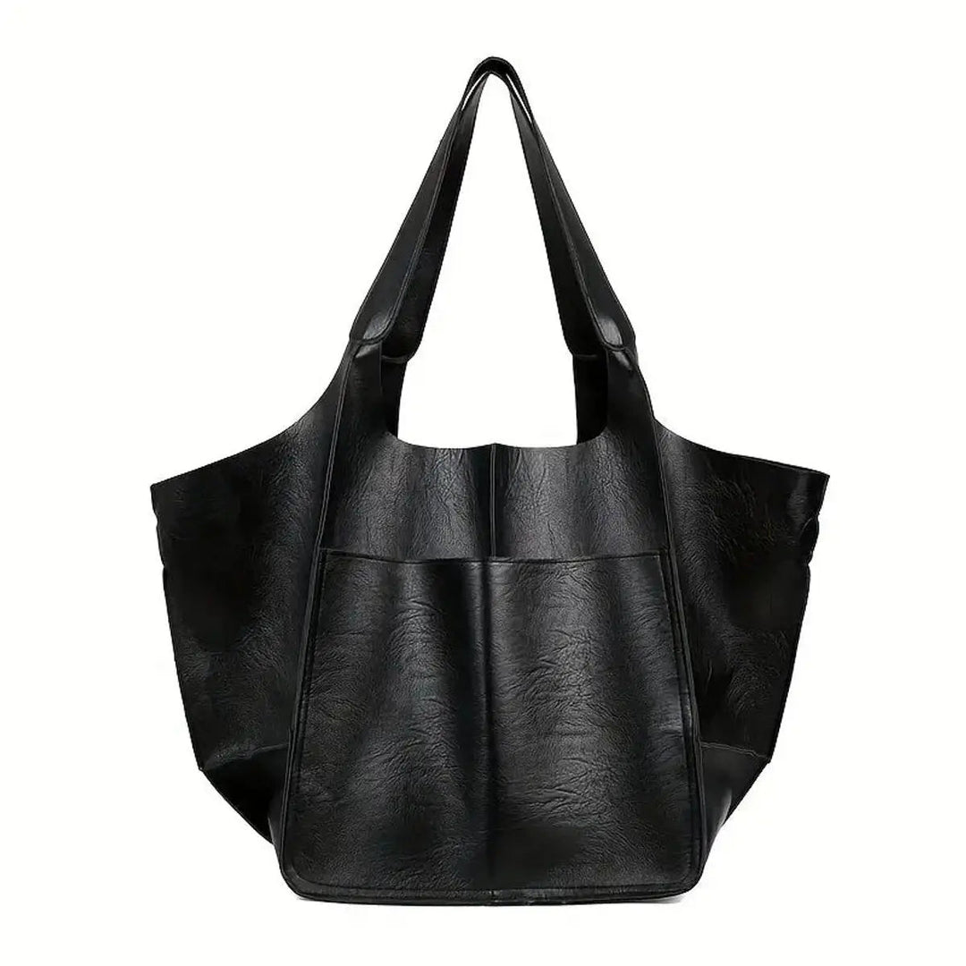 Functional women's work or travel bag: a large vegan leather shoulder tote.