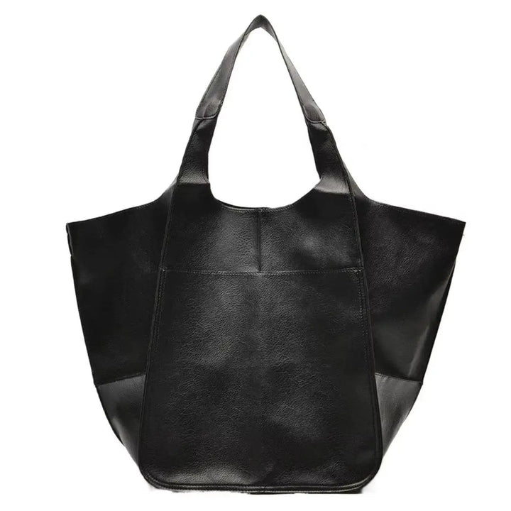 Sleek oversized vegan leather tote bag, designed for the modern woman.