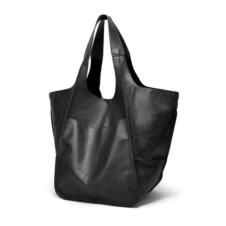 Versatile oversized vegan leather tote for women, combining style & utility.