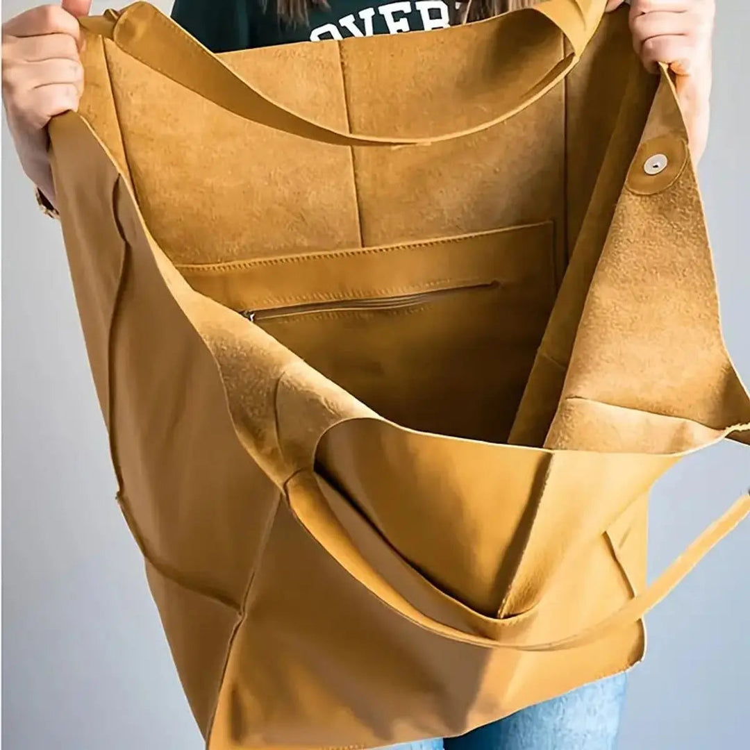 Versatile vegan leather women's bag, a stylish accessory for work or travel.