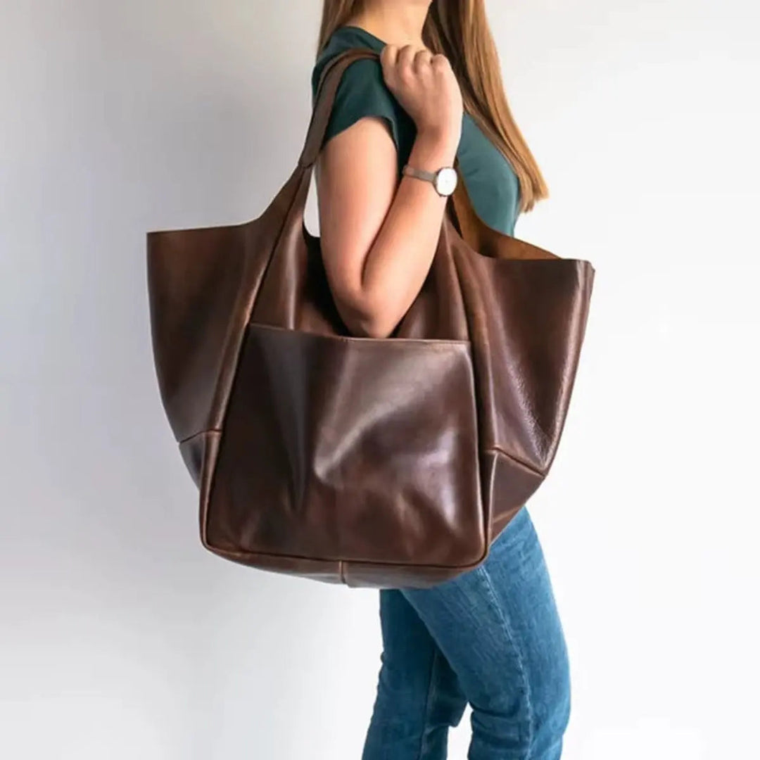 Large capacity vegan leather tote, excellent as a women's work or travel bag.