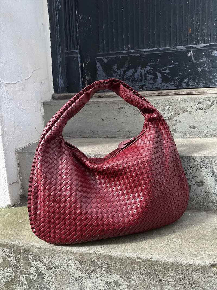 Woven shoulder bag, spacious & stylish, a versatile everyday essential for women.