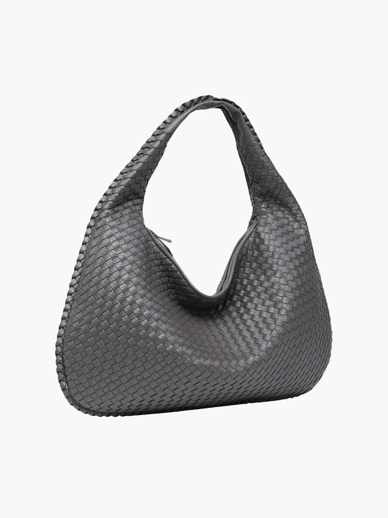 Large woven handbag for women, spacious, practical, and minimalist style.