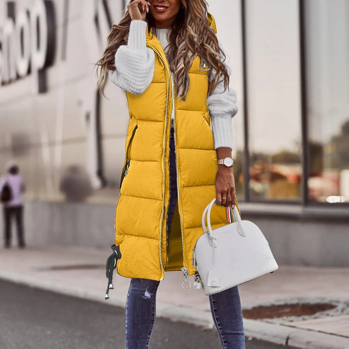 Cozy women's hooded padded vest for winter & autumn. Everyday comfort, stylish outerwear for women.
