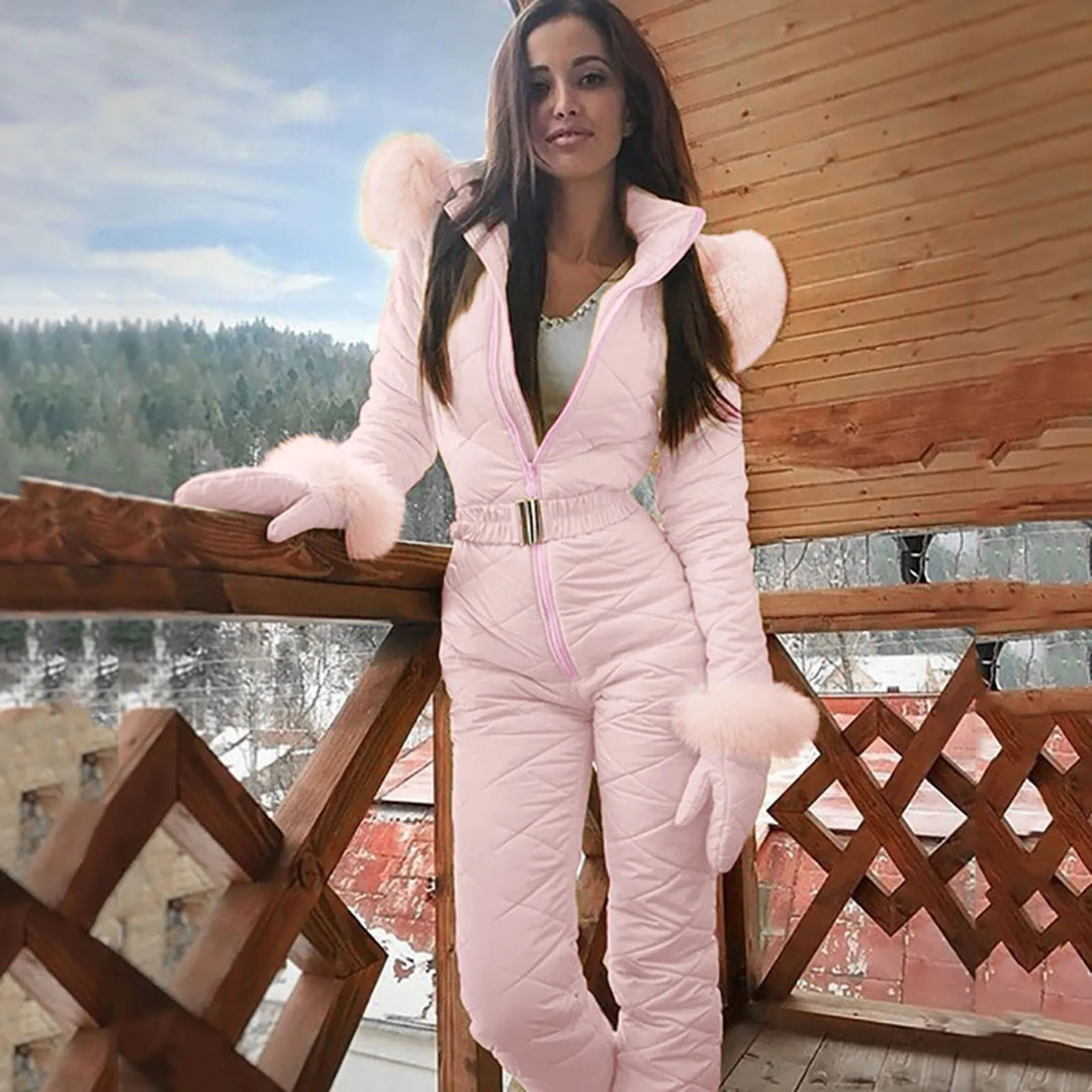 Fashionable women's padded winter suit for chic style & warmth. Essential winter fashion and outdoor gear.