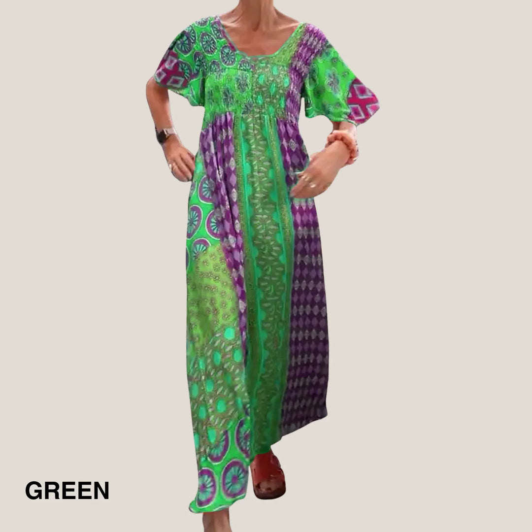 Versatile women's midi dress with unique paisley patchwork, V-neck, and smocked waist. Ideal for spring and summer.