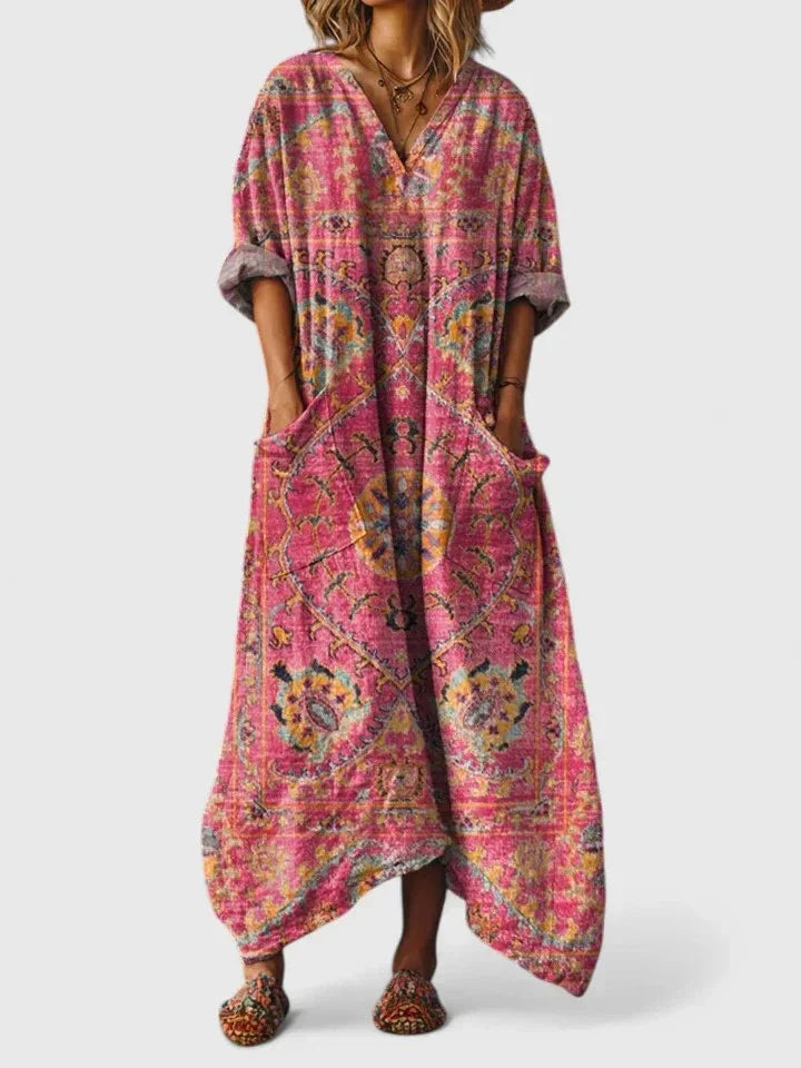Elegant V-neck 3/4-sleeve oversized maxi dress with vibrant paisley print & pockets for women.