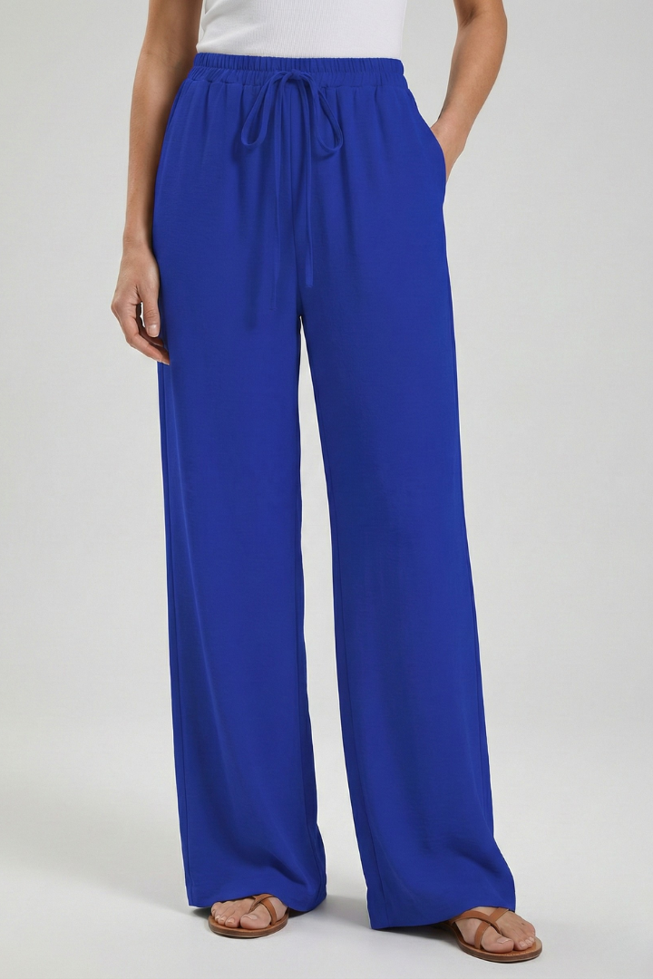 Comfortable flowy women's palazzo trousers. Wide-leg summer pants with drawstring waist & pockets.