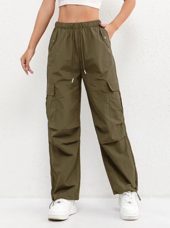 Comfortable women's parachute cargo pants, blend of utility and streetwear with a stylish drawstring waist.