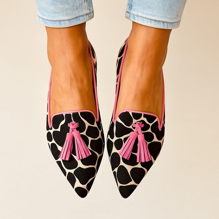 Comfortable women's patterned slip-on loafers with stylish tassels; ideal flat shoes for everyday elegance.