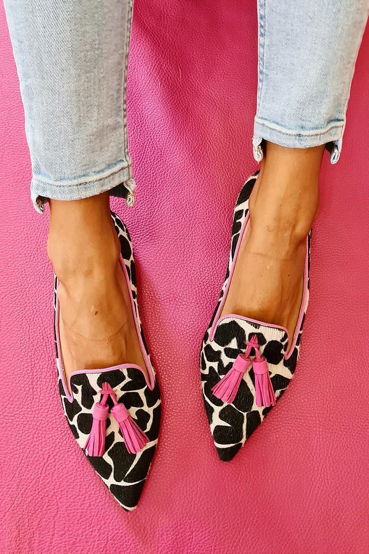 Elegant women's patterned slip-on loafers with sophisticated tassel detail; comfortable flat shoes for casual wear.
