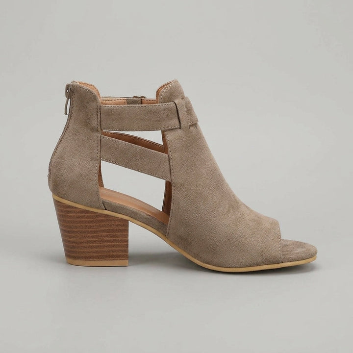 Elegant women's peep toe block heel sandals with a unique cut-out ankle buckle strap, perfect for summer outfits.
