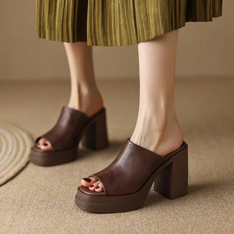 Elegant women's platform mule sandals, peep-toe design with a comfortable block heel for summer.