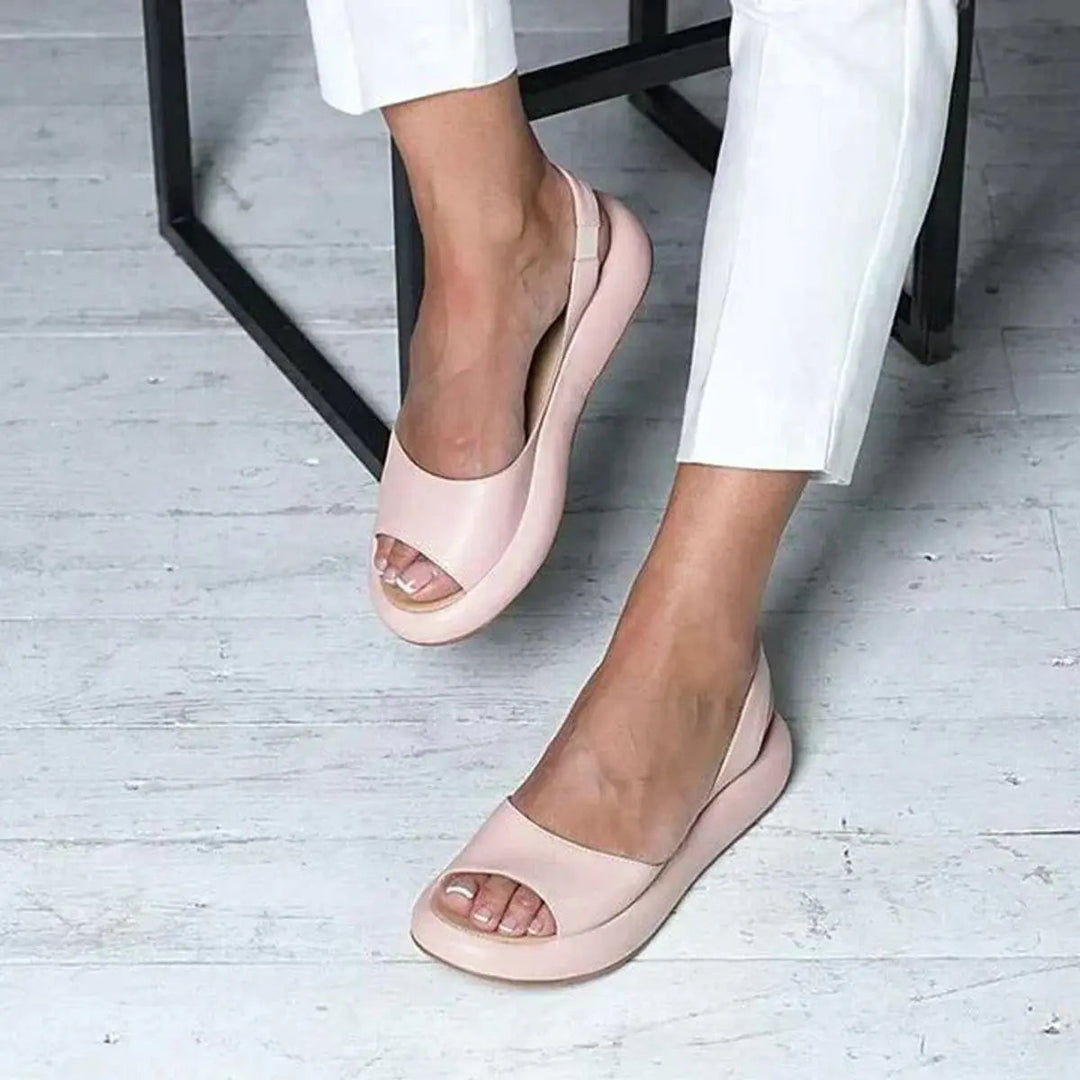 Women's peep toe slingback flat sandals, cushioned for comfort and everyday wear.