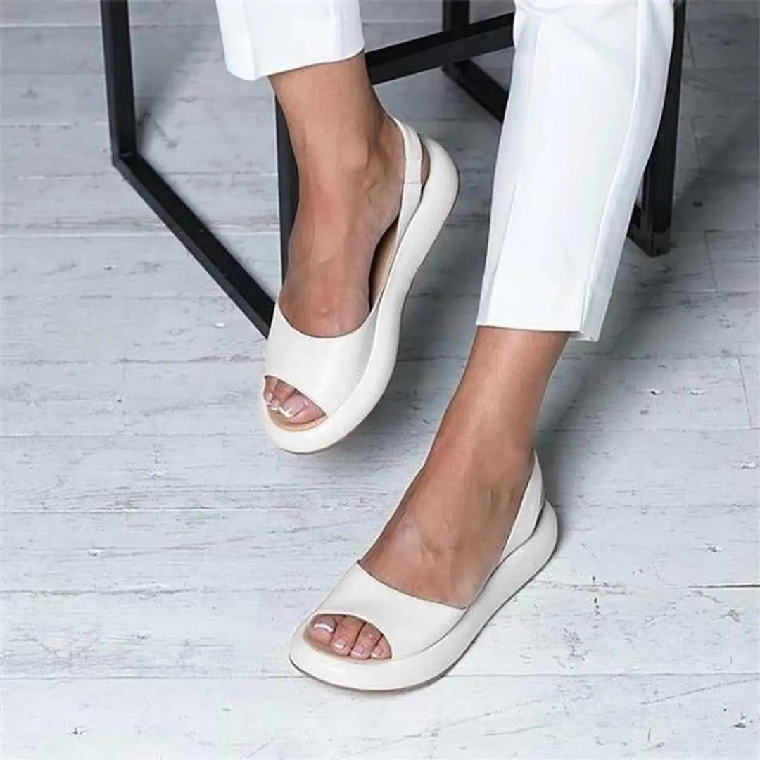 Stylish women's peep toe slingback flat sandals, cushioned for ultimate comfort & everyday wear.