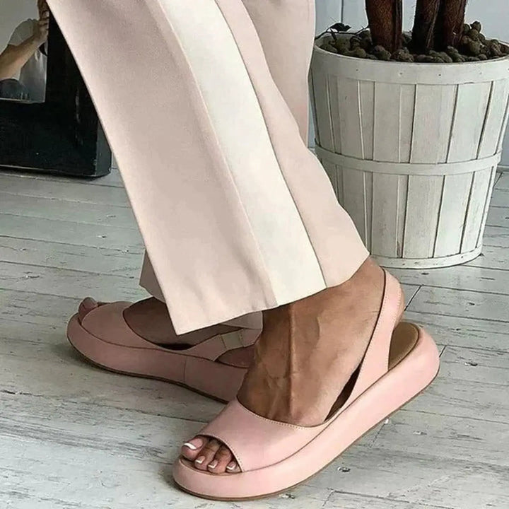 Open toe women's slingback flat sandals with cushioning, ideal for spring & summer outings.