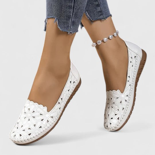 Breathable perforated slip-on flats for women. Comfortable, casual closed-toe shoes for spring/summer.