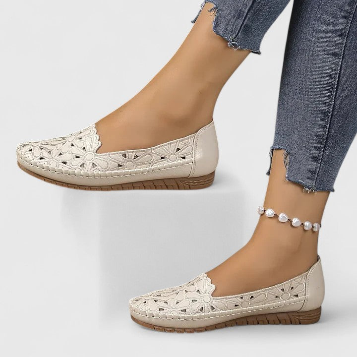Versatile women's slip-on flats. Perforated design, comfortable for everyday casual wear.