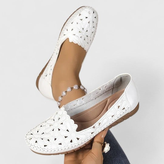 Comfortable women's slip-on flats. Perforated, easy-wear everyday casual shoes for all-day wear.