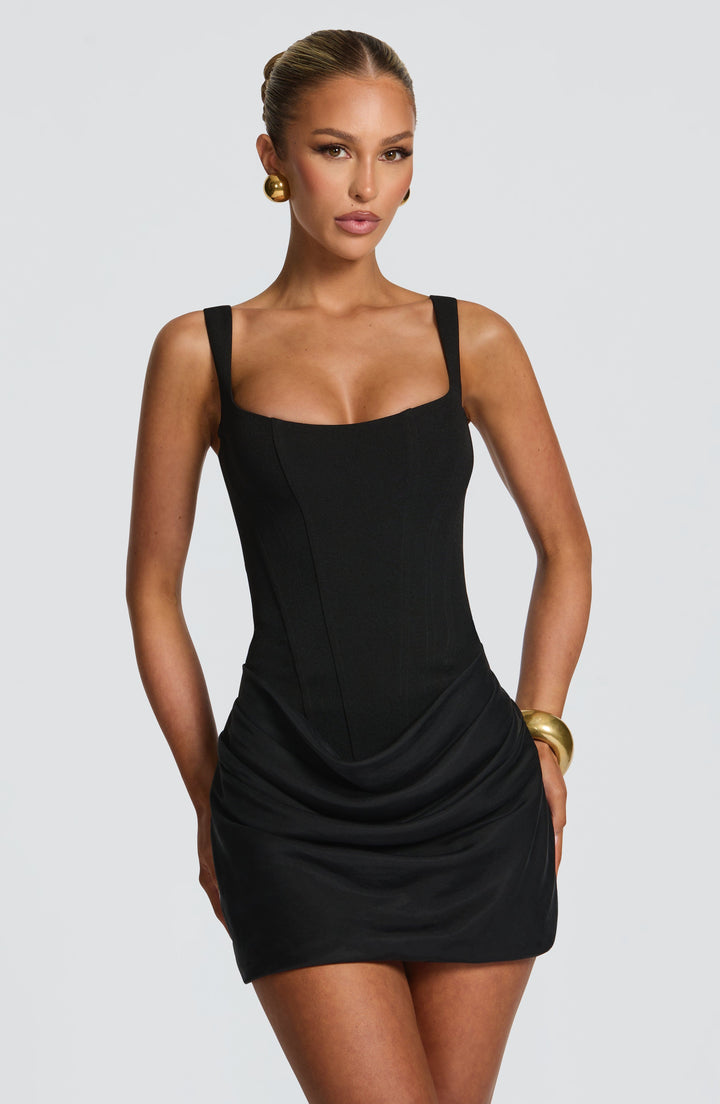 Flattering petite women's ruched mini dress. A chic short cocktail dress, perfect for parties and elegant evening wear.