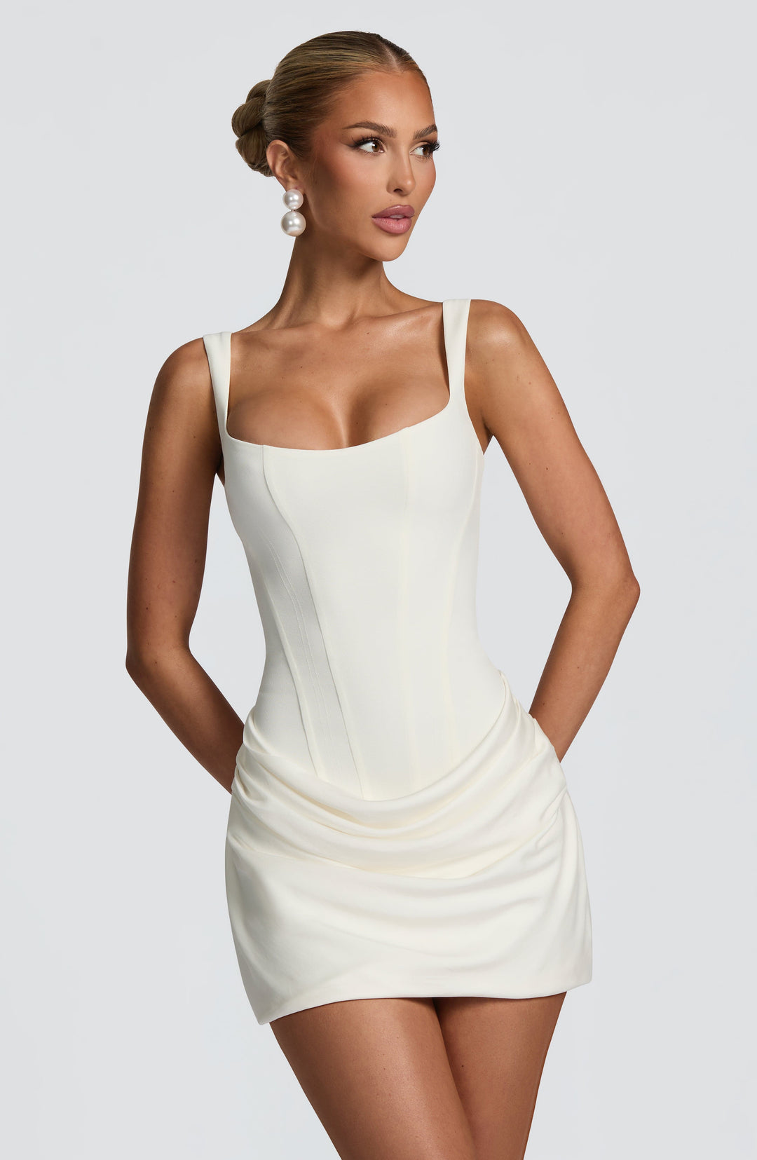 Women's petite ruched mini cocktail dress. A stylish party dress, perfect for evening wear and special events.