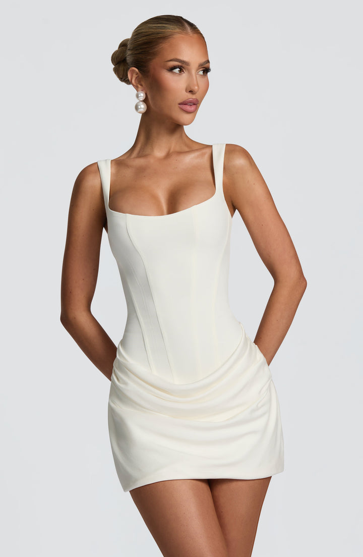 Women's petite ruched mini cocktail dress. A stylish party dress, perfect for evening wear and special events.