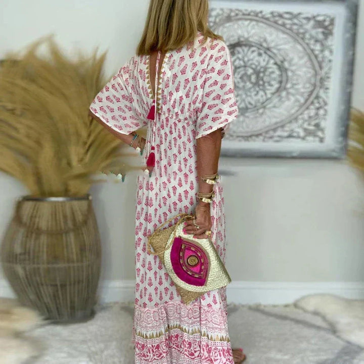 Pink boho print V-neck short sleeve maxi dress for women. Casual, flowy bohemian style for summer & spring.