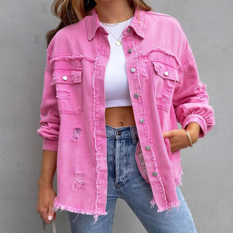 Women's pink distressed denim jacket with frayed hem and button-up front, perfect for casual spring fashion.