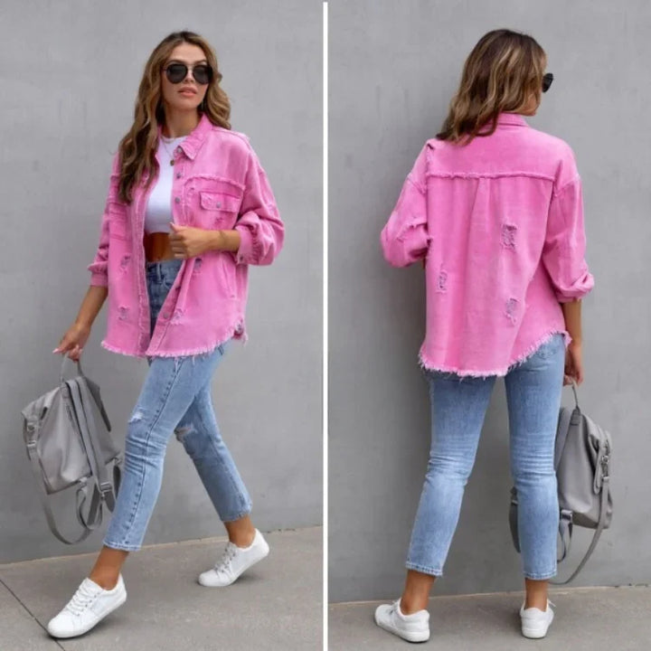 Fashionable women's pink distressed denim jacket with frayed hem, a versatile button-up for spring/fall outerwear.