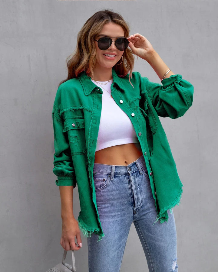 Vibrant pink distressed denim jacket for women, featuring a button-up front and chic frayed edges. Casual style.