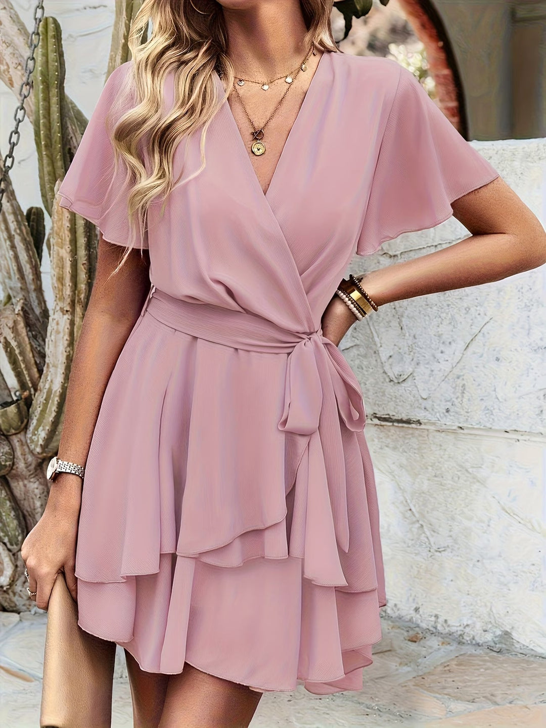 Elegant pink flowy short sleeve dress for women. Effortless comfort & versatile style for casual or semi-formal occasions.